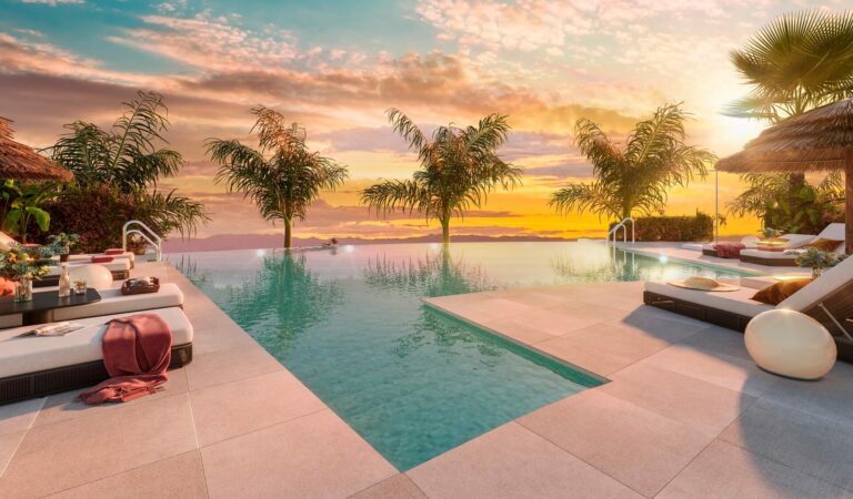 Piscina atardecer Soleia Living Exxacon viviendas de obra nueva en Mijas Costa del Sol